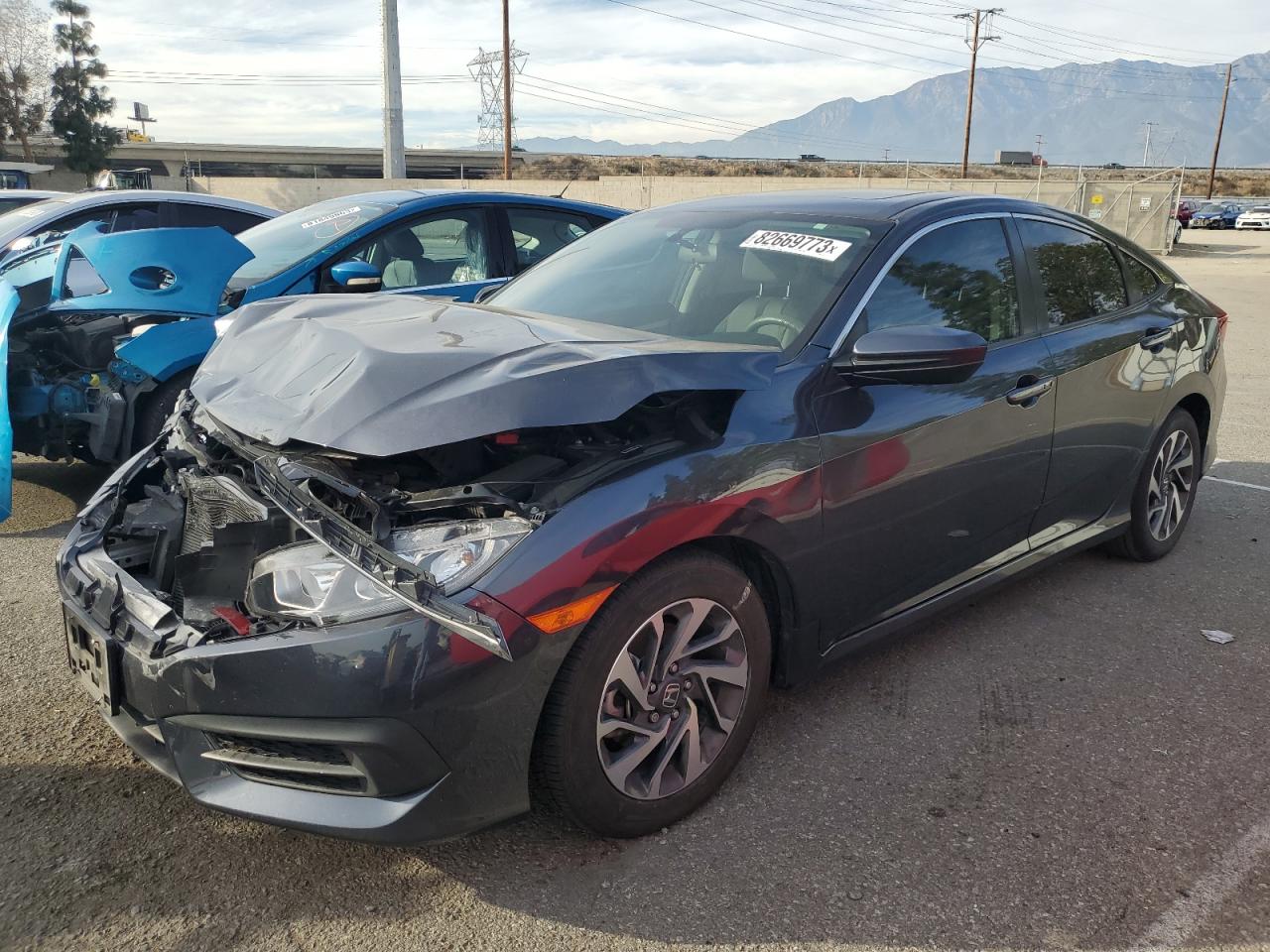 Image 1 of 2018 HONDA CIVIC EX 2018 with VIN 2HGFC2F73JH571711