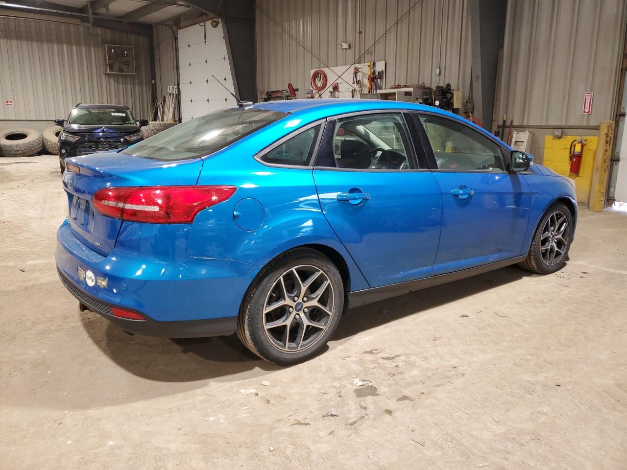 Obraz 3 z 2017 FORD FOCUS SEL 2017 z VIN 1FADP3H24HL203333