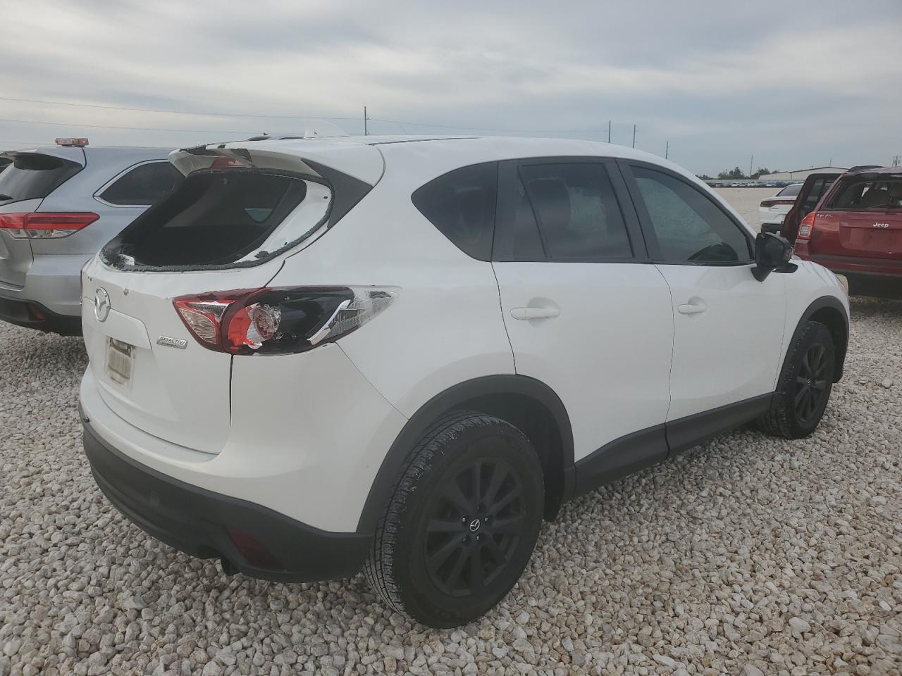 Image 3 of 2014 MAZDA CX-5 SPORT 2014 with VIN JM3KE2BE7E0300924