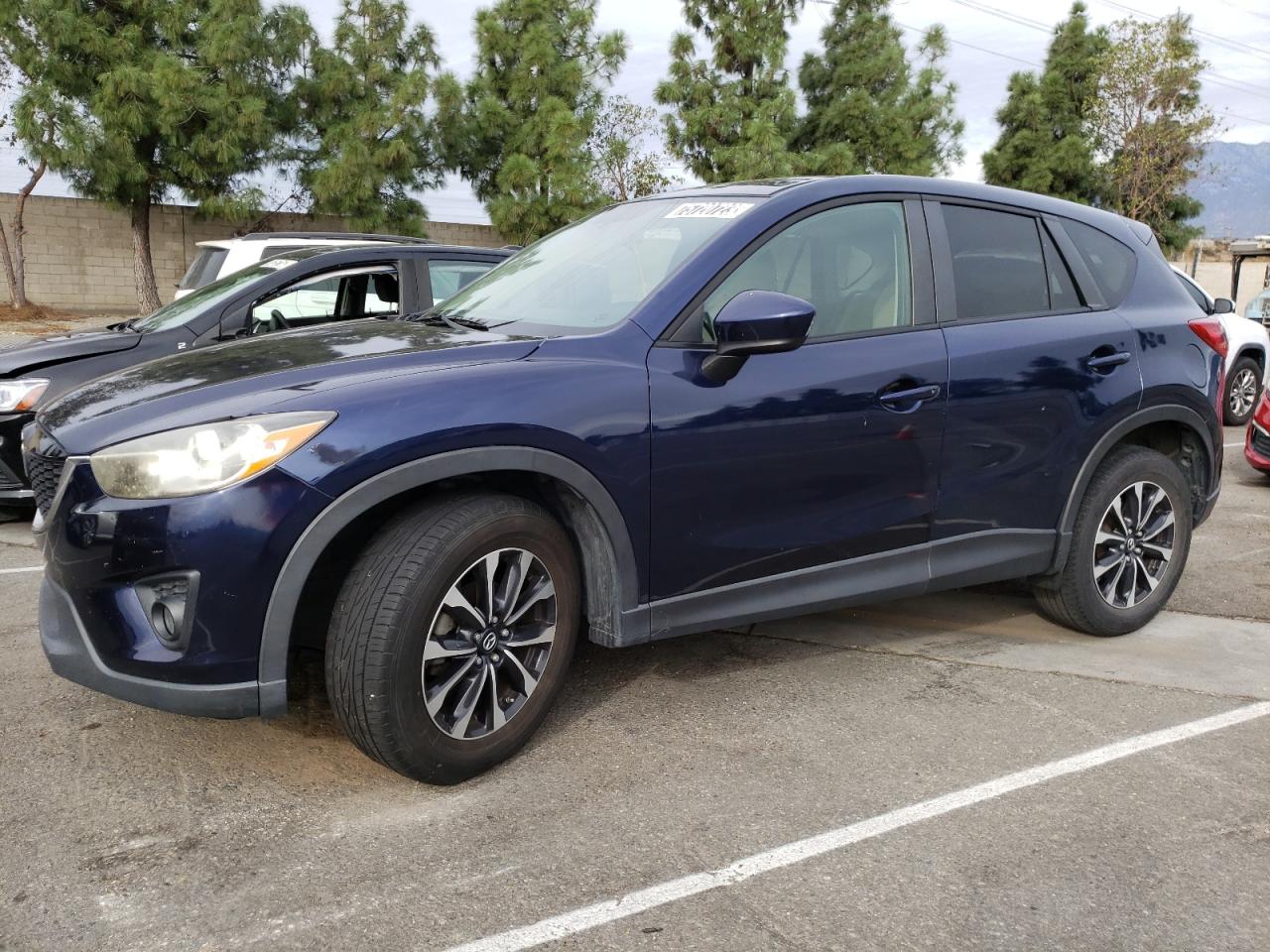 Obraz 1 z 2014 MAZDA CX-5 TOURING 2014 z VIN JM3KE2CY1E0330154