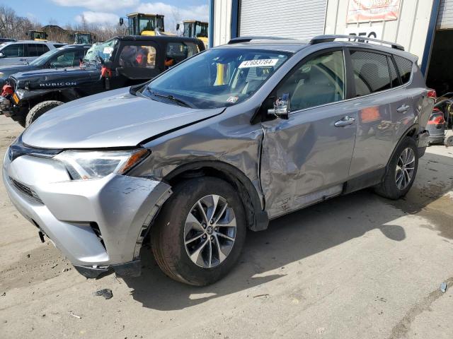 Изображение 1 2018 TOYOTA RAV4 HV LE 2018 с VIN JTMRJREV7JD186322