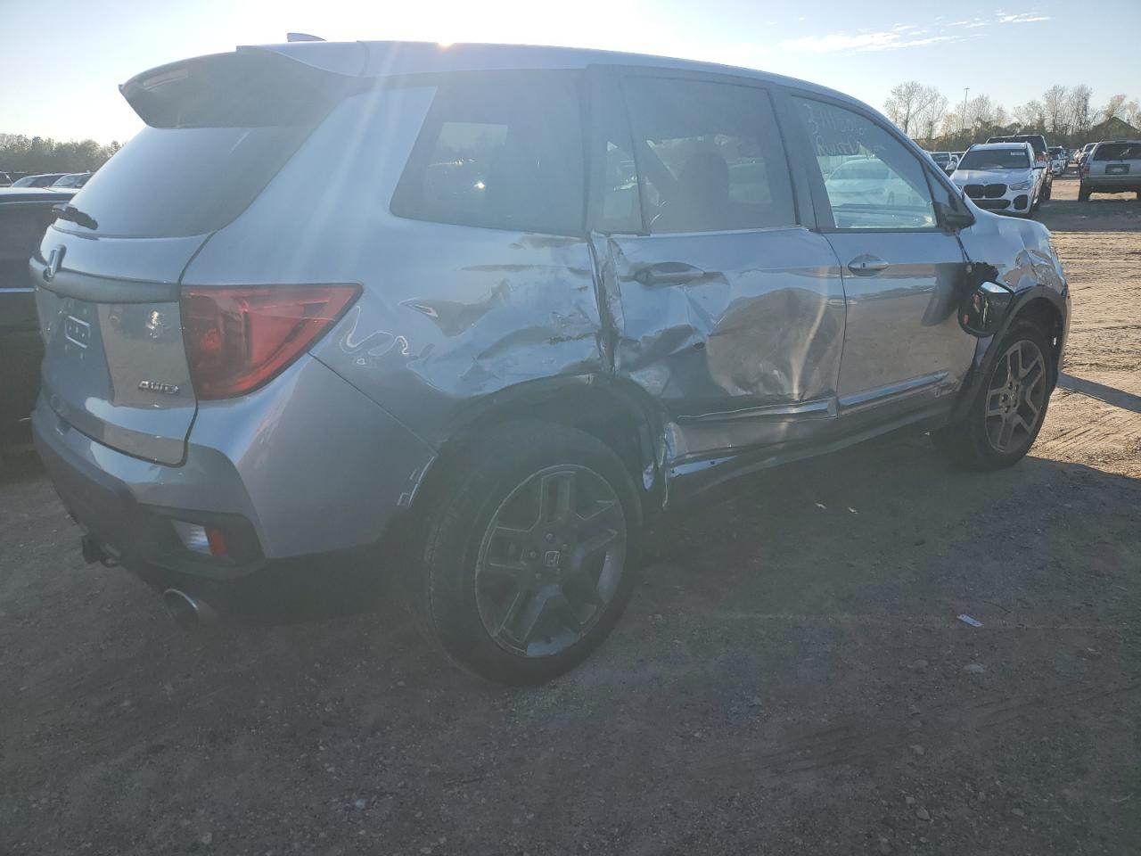 Изображение 3 2022 HONDA PASSPORT EXL 2022 с VIN 5FNYF8H53NB004035