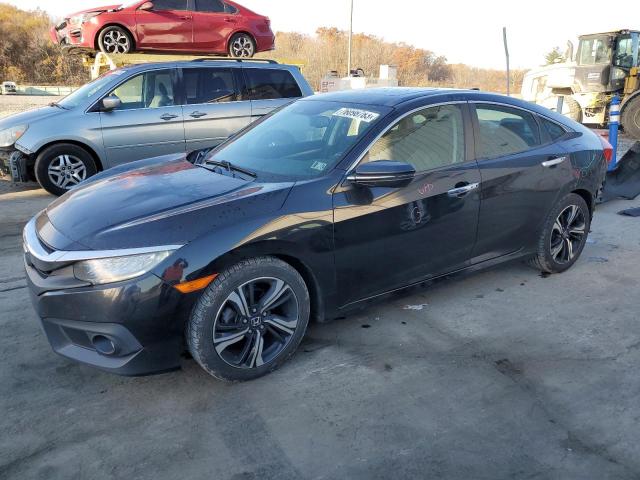 Image 1 of 2016 HONDA CIVIC TOURING 2016 with VIN 2HGFC1F9XGH646196