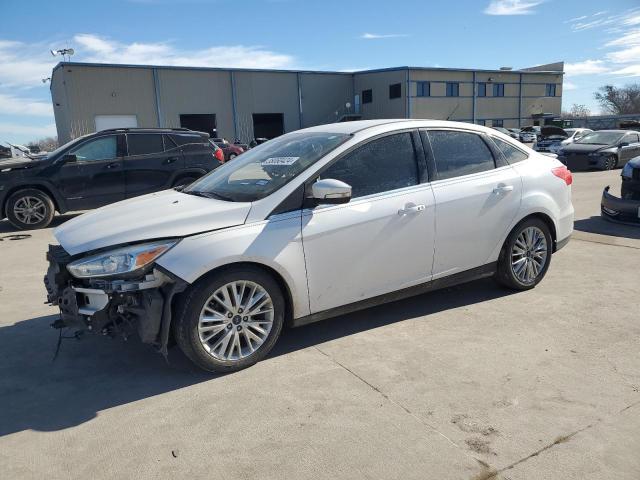 Image 1 of 2016 FORD FOCUS TITANIUM 2016 with VIN 1FADP3J28GL336671