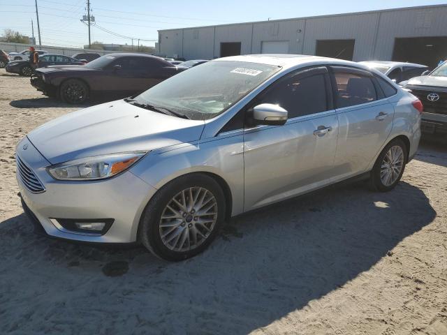 Image 1 of 2016 FORD FOCUS TITANIUM 2016 with VIN 1FADP3J22GL207471