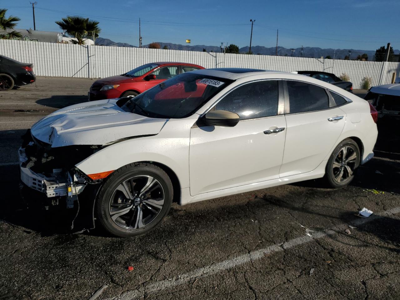 Изображение 1 2017 HONDA CIVIC TOURING 2017 с VIN 2HGFC1F99HH637118