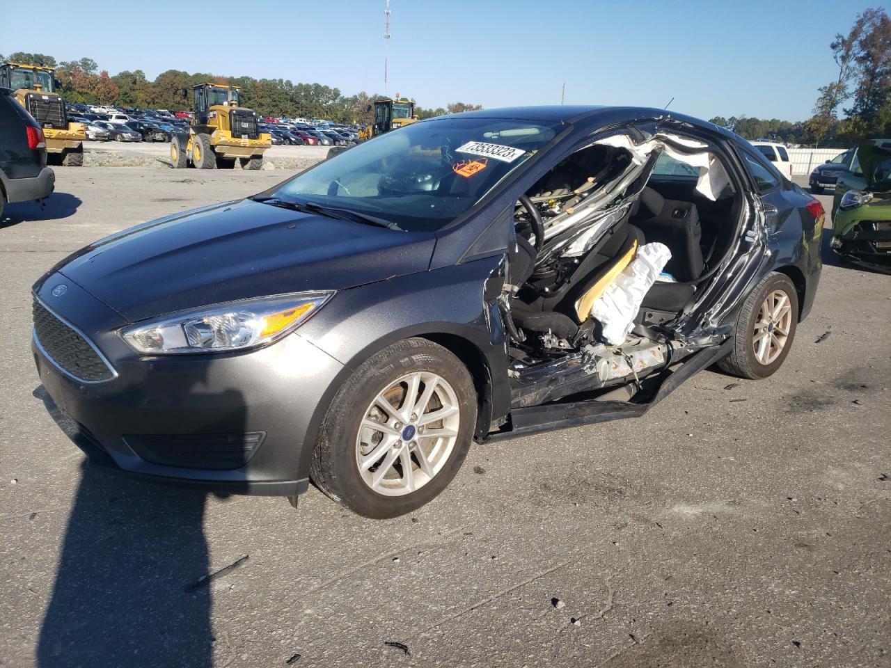 Image 1 of 2018 FORD FOCUS SE 2018 with VIN 1FADP3FE4JL298902