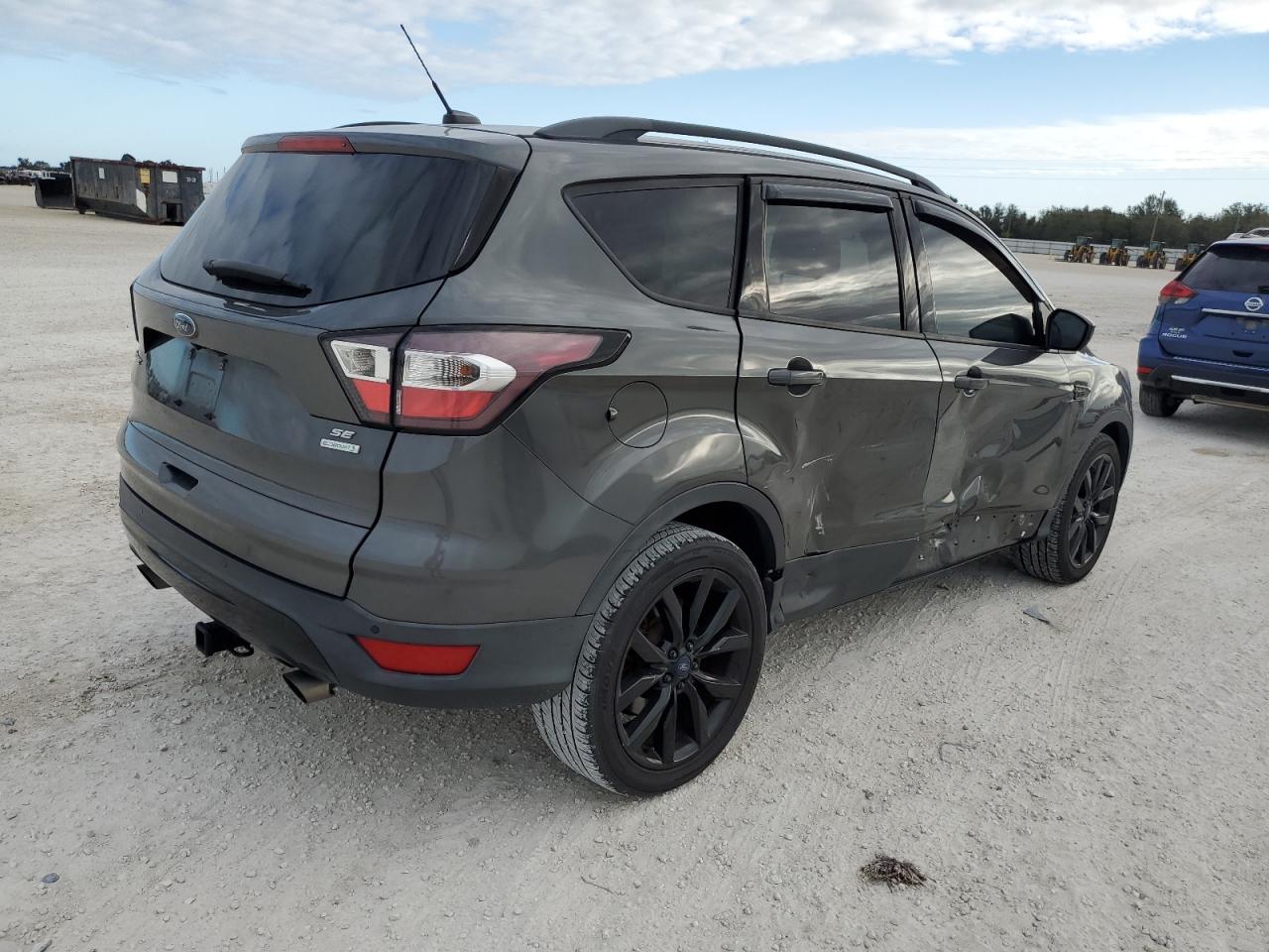 Изображение 3 2017 FORD ESCAPE SE 2017 с VIN 1FMCU0G93HUB74019