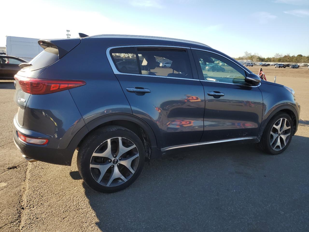 Изображение 3 2017 KIA SPORTAGE SX 2017 с VIN KNDPRCA66H7180693