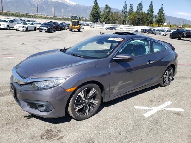 Image 1 of 2018 HONDA CIVIC TOURING 2018 with VIN 2HGFC3B94JH356352