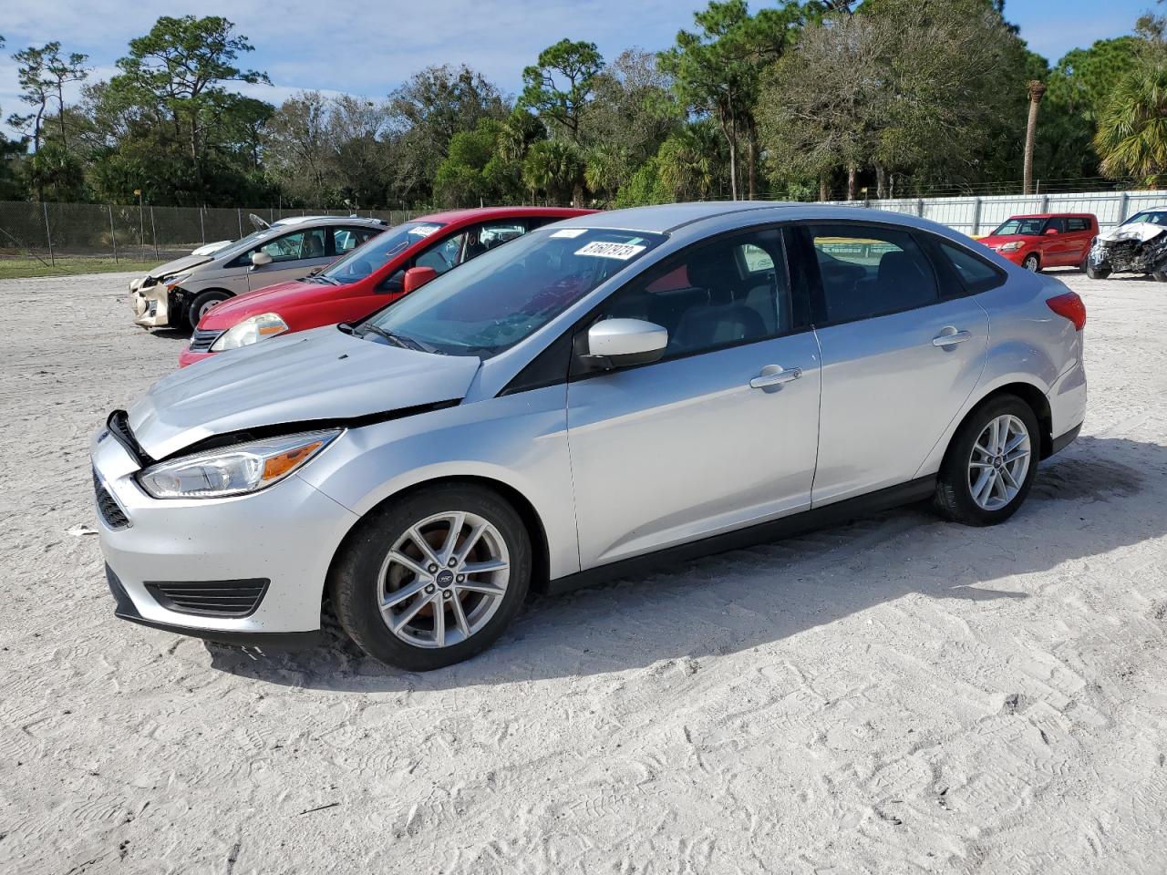 Image 1 of 2018 FORD FOCUS SE 2018 with VIN 1FADP3F23JL295561
