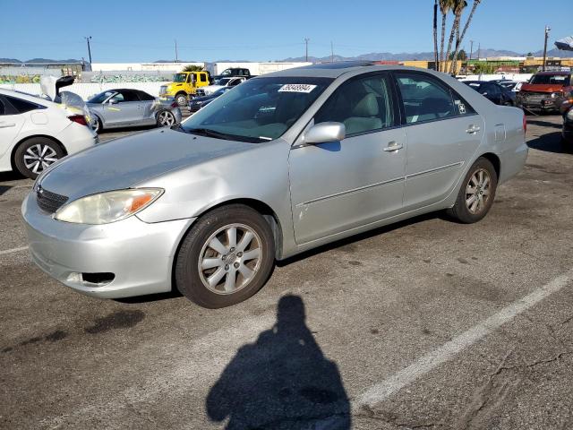 Obraz 1 z 2002 TOYOTA CAMRY LE 2002 z VIN 4T1BF30K52U002182