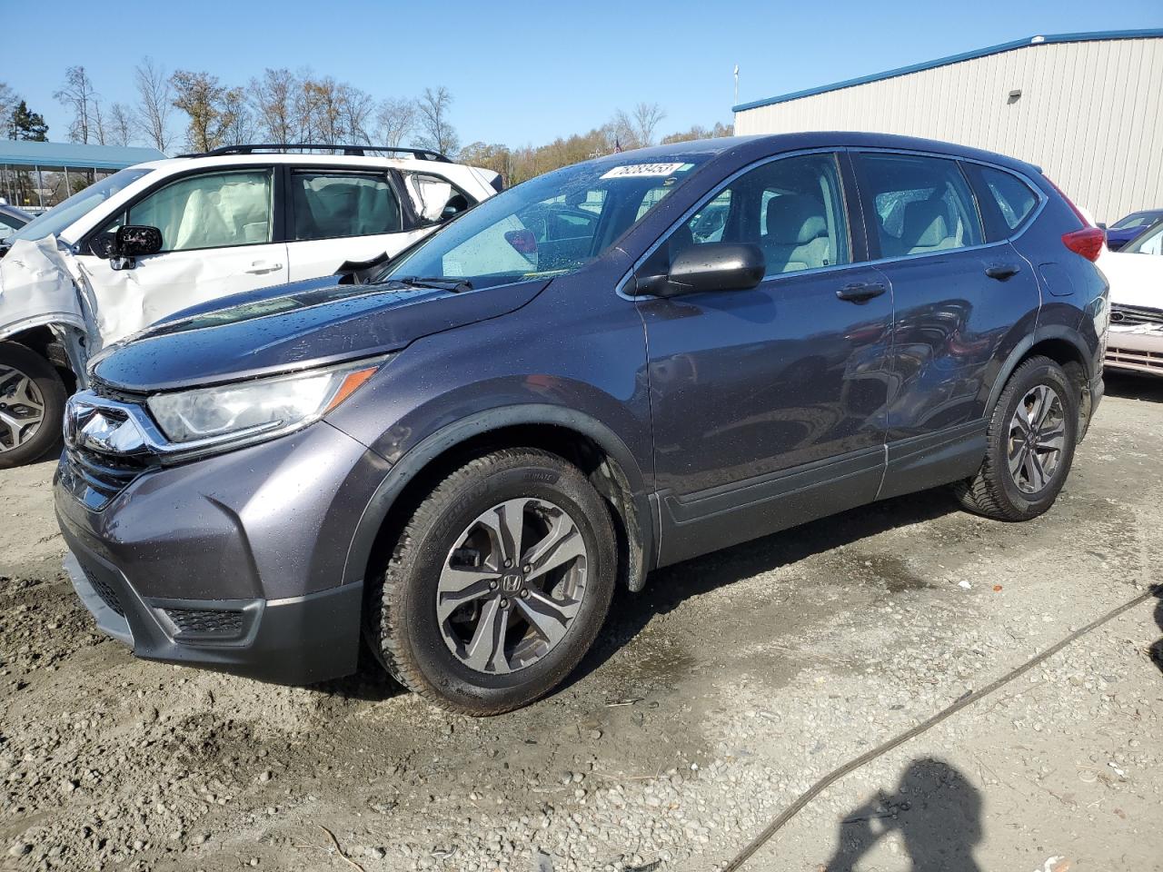 Obraz 1 z 2017 HONDA CR-V LX 2017 z VIN 7FARW5H38HE009953