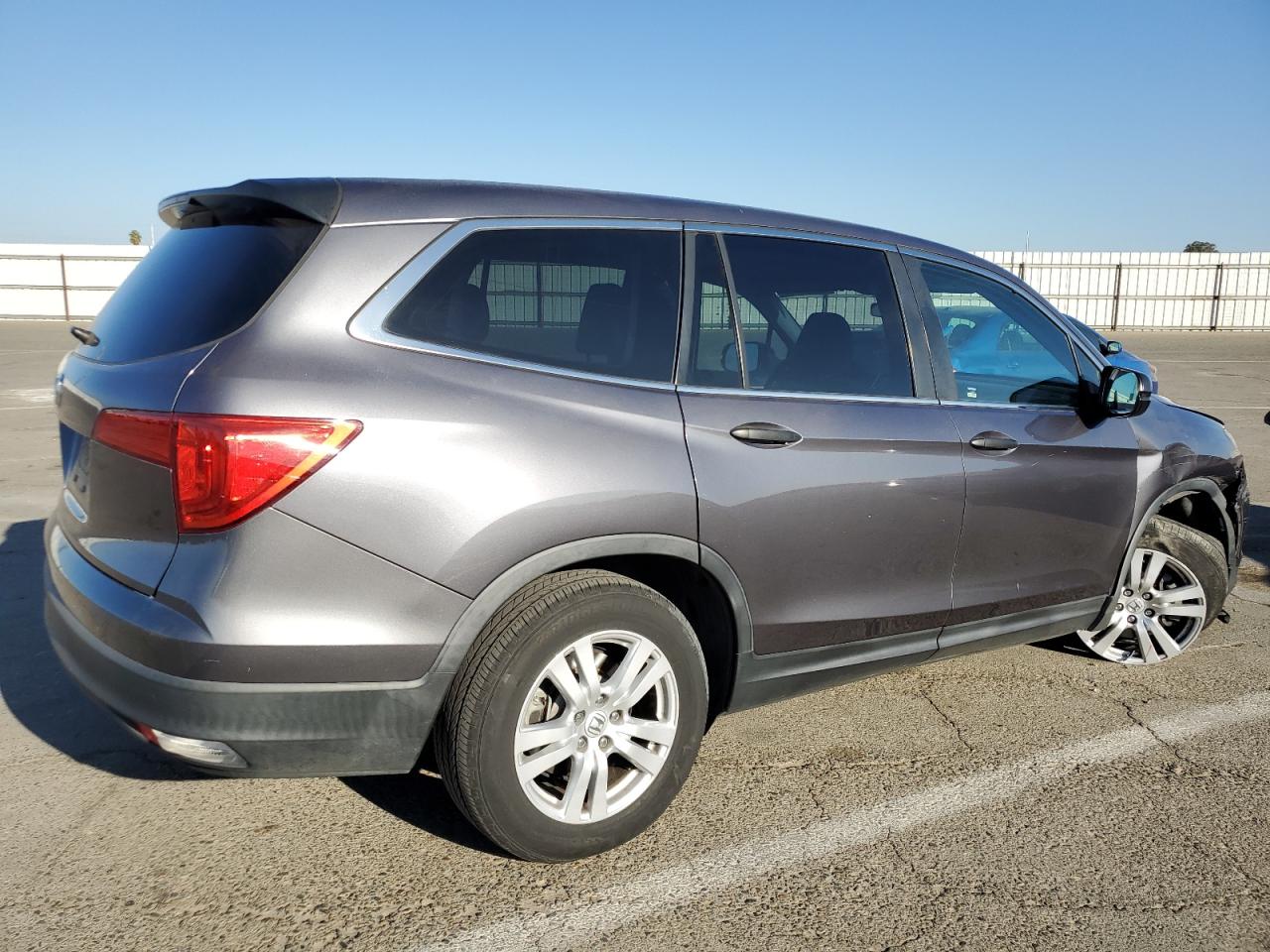 Изображение 3 2017 HONDA PILOT LX 2017 с VIN 5FNYF5H12HB007945