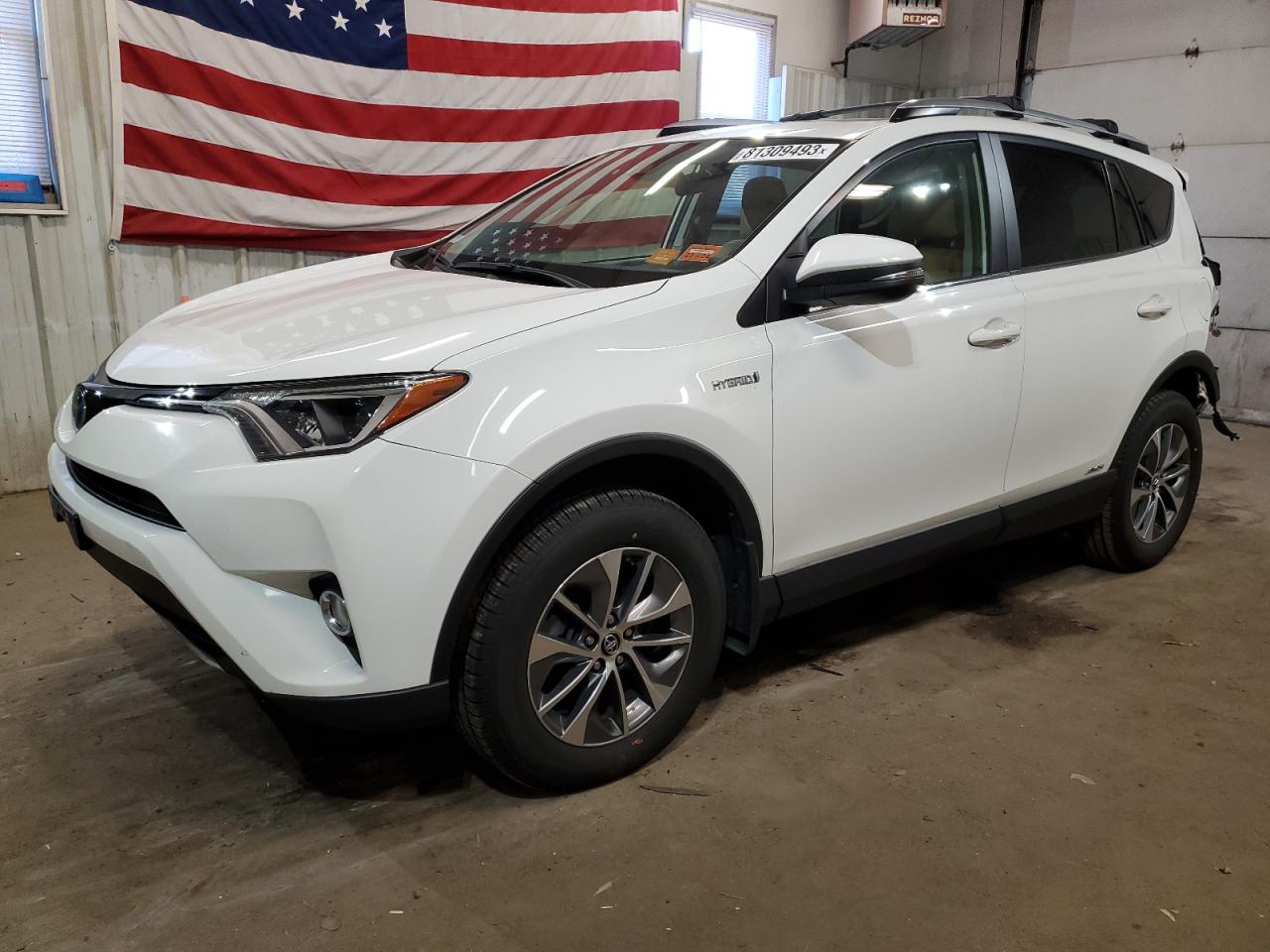 Image 1 of 2017 TOYOTA RAV4 HV LE 2017 with VIN JTMRJREV2HD092441