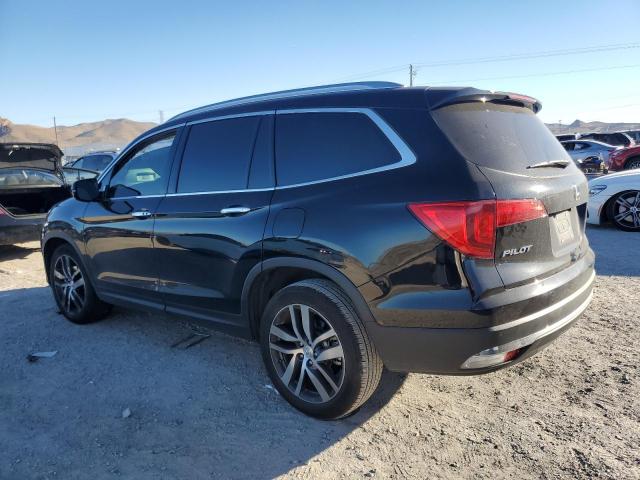 Изображение 2 2017 HONDA PILOT TOURING 2017 с VIN 5FNYF5H95HB004351