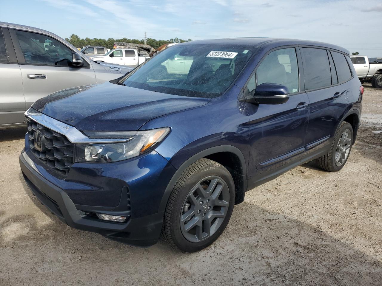 Изображение 1 2023 HONDA PASSPORT EXL 2023 с VIN 5FNYF8H50PB004917