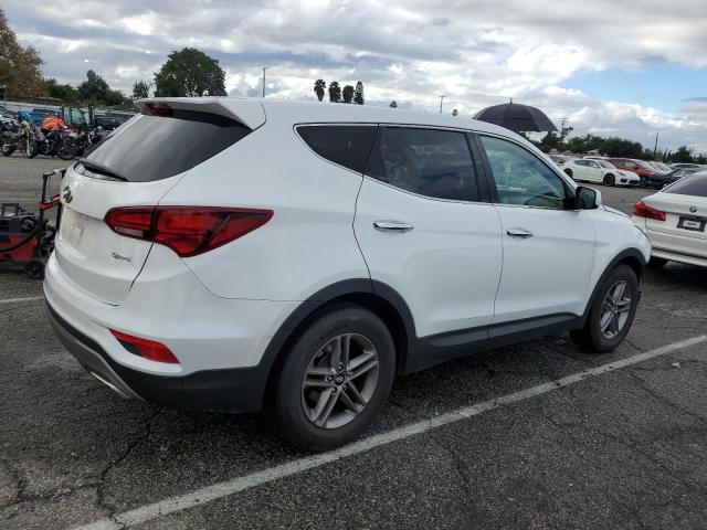 Image 3 of 2018 Hyundai Santa Fe 2018 with VIN 5NMZT3LB1JH081766