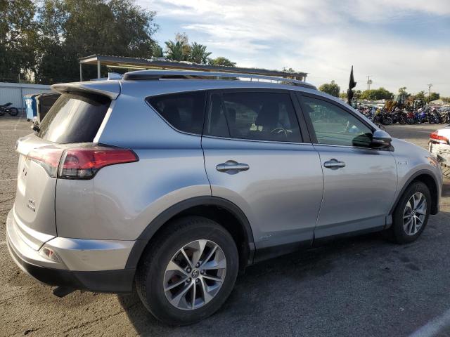 Изображение 3 2018 TOYOTA RAV4 HV LE 2018 с VIN JTMRJREV1JD157611