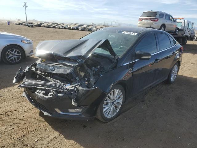Image 1 of 2018 FORD FOCUS TITANIUM 2018 with VIN 1FADP3J29JL271658