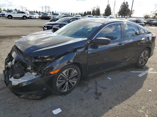 Image 1 of 2016 HONDA CIVIC EXL 2016 with VIN 2HGFC1F74GH636908