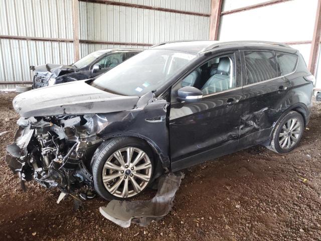 Obraz 1 z 2017 FORD ESCAPE TITANIUM 2017 z VIN 1FMCU0JD8HUD84371