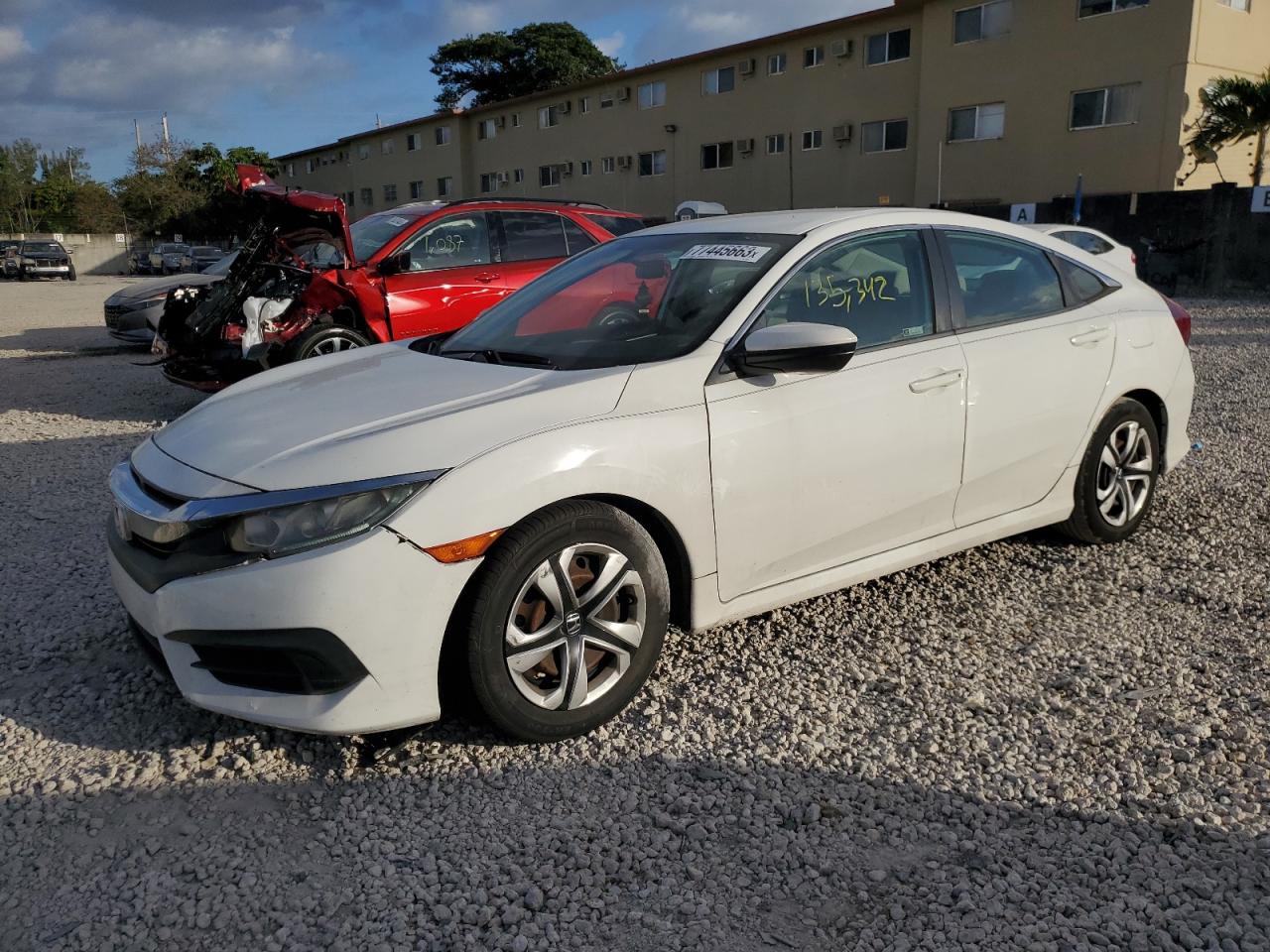 Obraz 1 z 2018 HONDA CIVIC LX 2018 z VIN 19XFC2F55JE032953