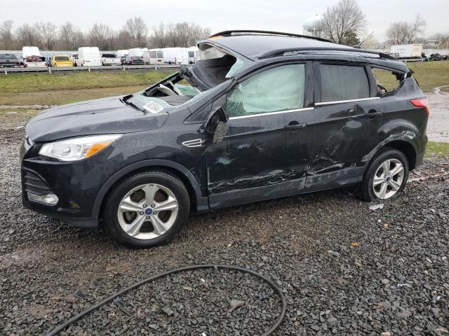Image 1 of 2016 FORD ESCAPE SE 2016 with VIN 1FMCU9GX1GUB18730