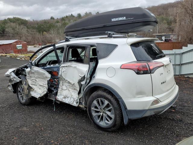 Изображение 2 2017 TOYOTA RAV4 HV LE 2017 с VIN JTMRJREV6HD076971