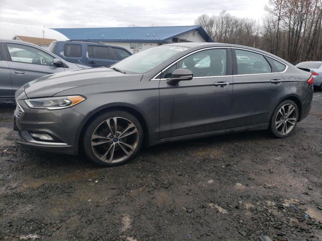 Image 1 of 2017 FORD FUSION TITANIUM 2017 with VIN 3FA6P0D90HR188549