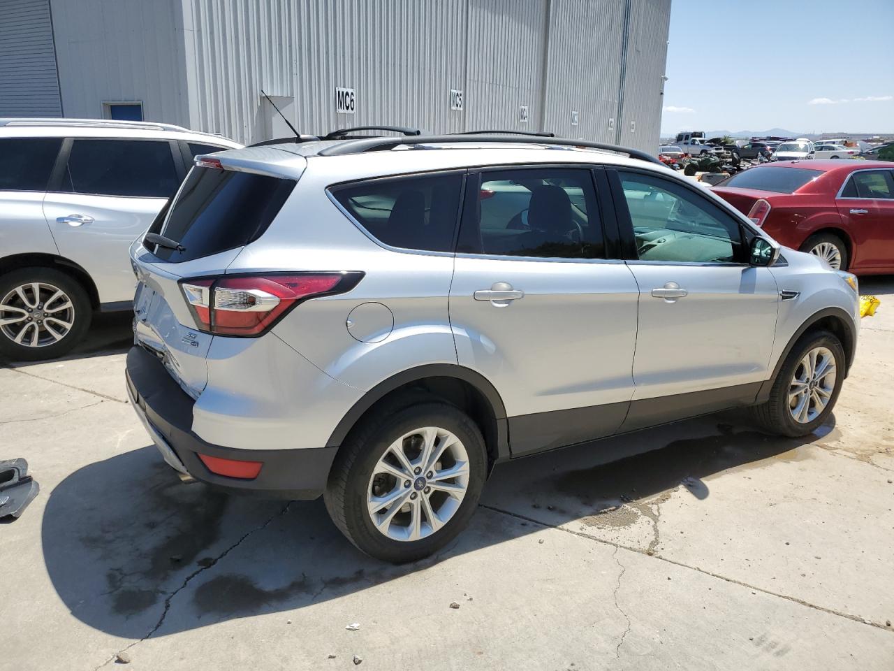 Image 3 of 2017 FORD ESCAPE SE 2017 with VIN 1FMCU9G90HUC02637