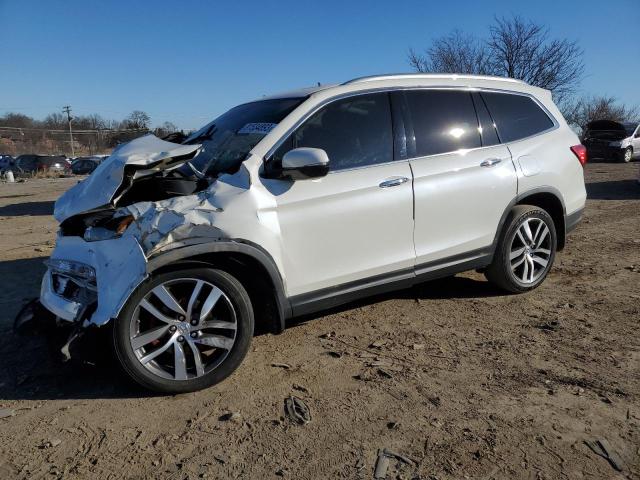Obraz 1 z 2016 HONDA PILOT TOURING 2016 z VIN 5FNYF6H95GB069513