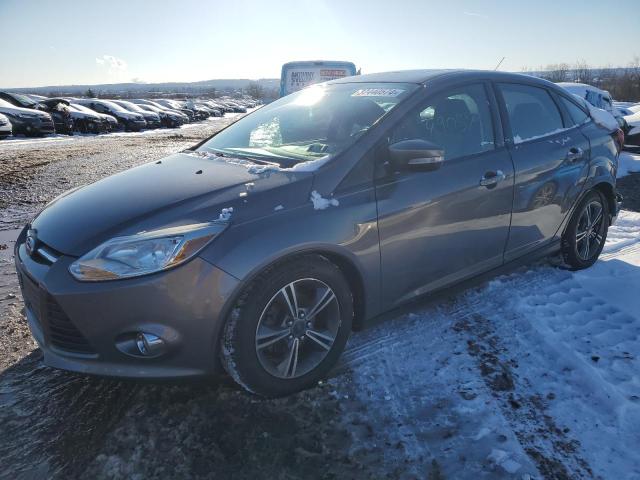 Image 1 of 2014 FORD FOCUS SE 2014 with VIN 1FADP3F24EL377854