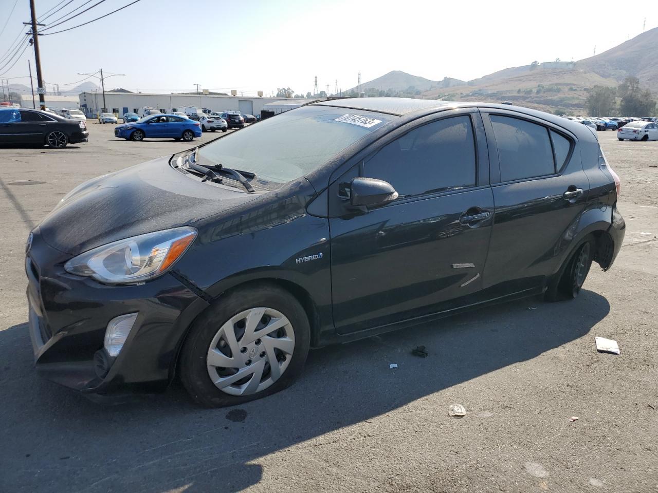 Obraz 1 z 2015 TOYOTA PRIUS C  2015 z VIN JTDKDTB3XF1090573
