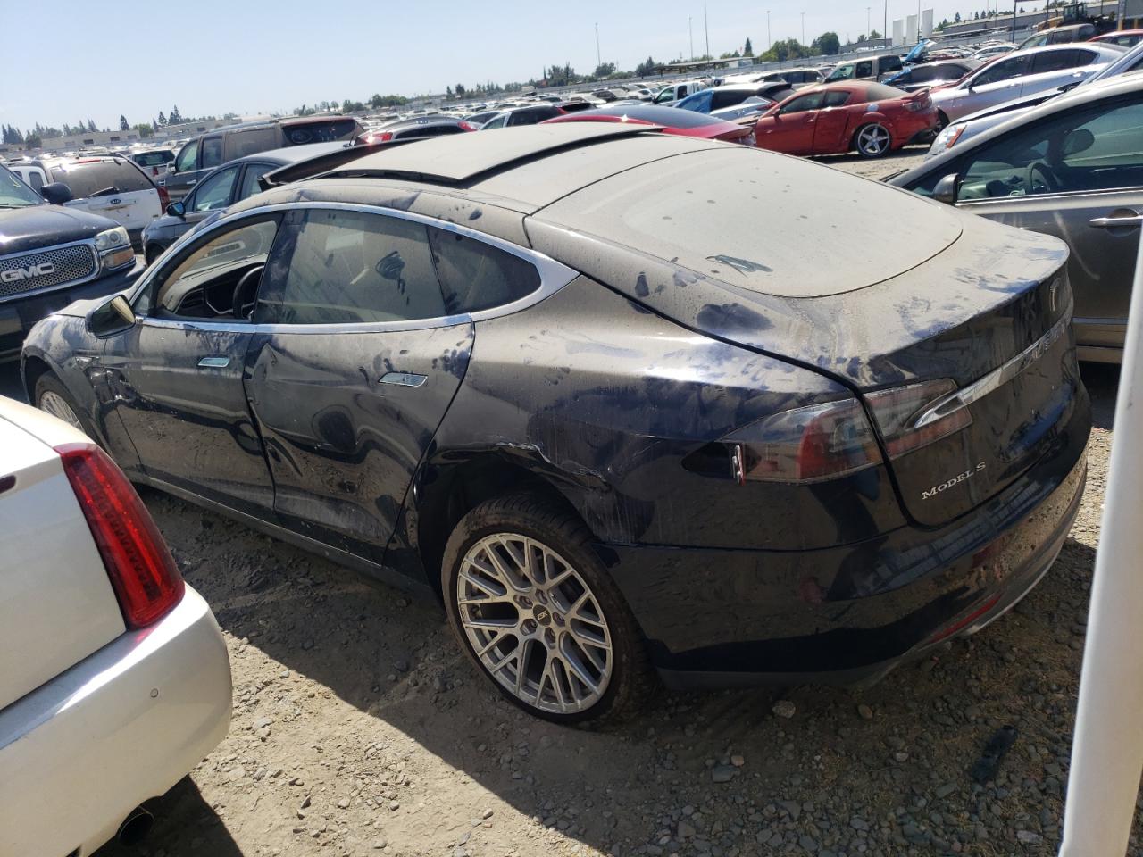 Изображение 2 Tesla Model S 2013 с VIN 5YJSA1DN7DFP19626