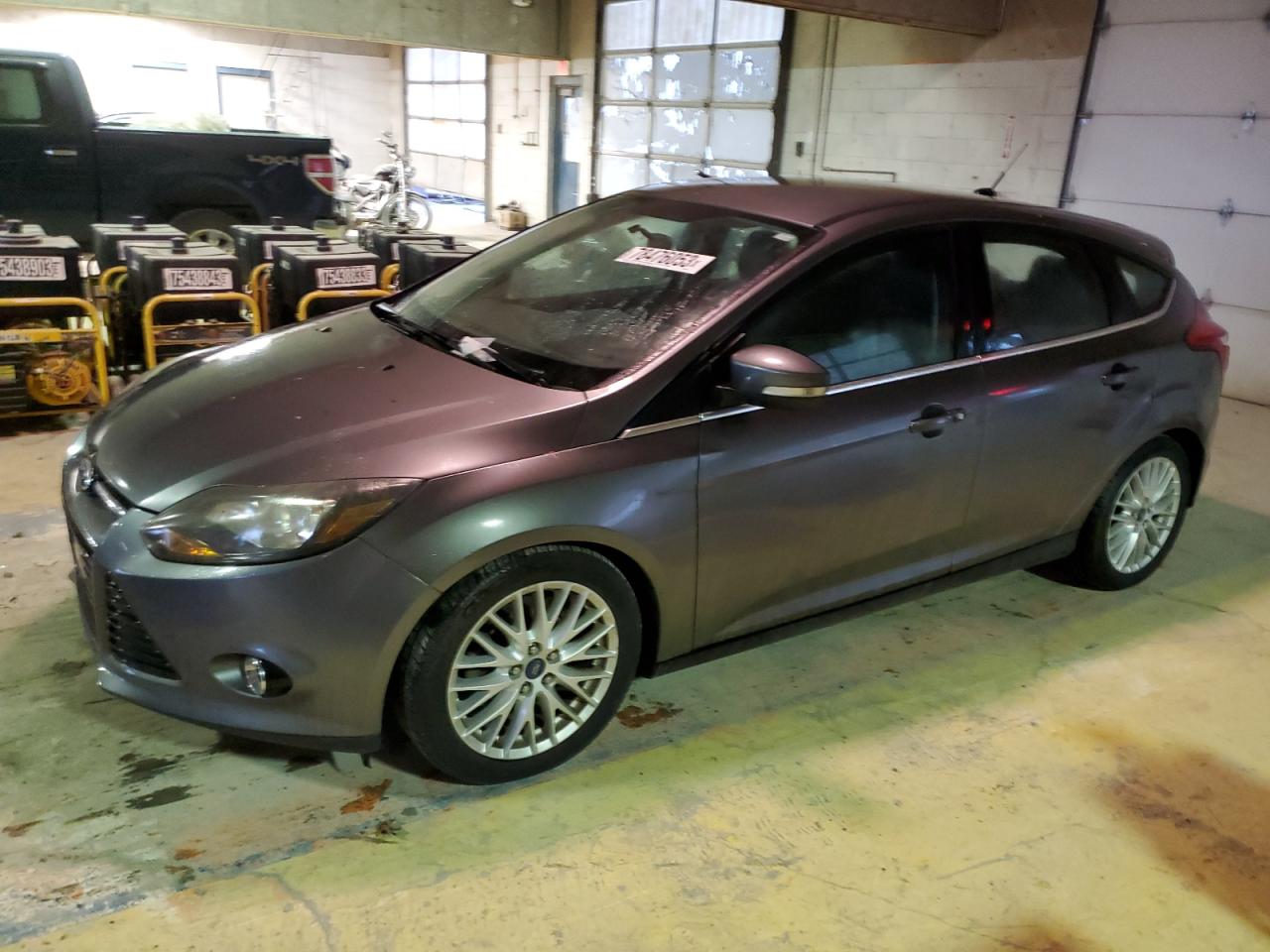 Image 1 of 2014 FORD FOCUS TITANIUM 2014 with VIN 1FADP3N22EL380351