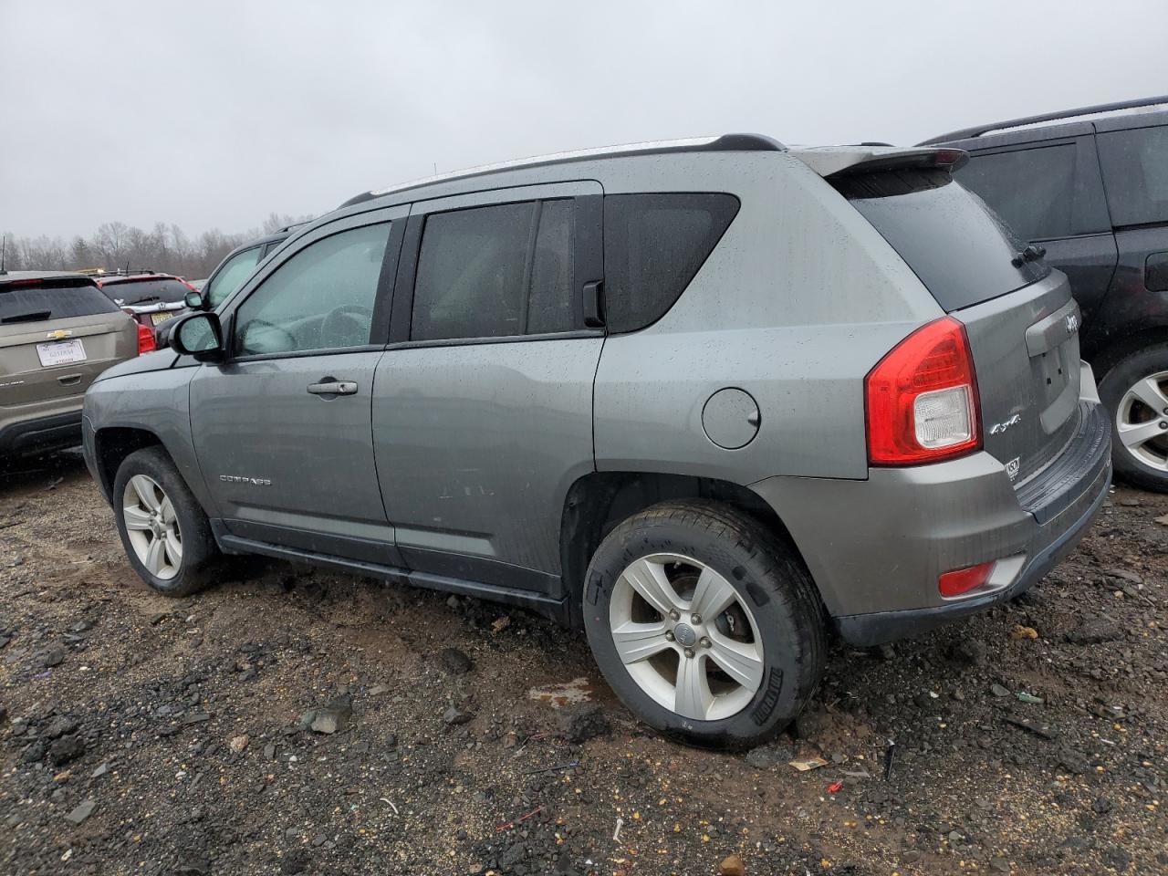Image 2 of 2011 JEEP COMPASS SPORT 2011 with VIN 1J4NF1FB6BD202009