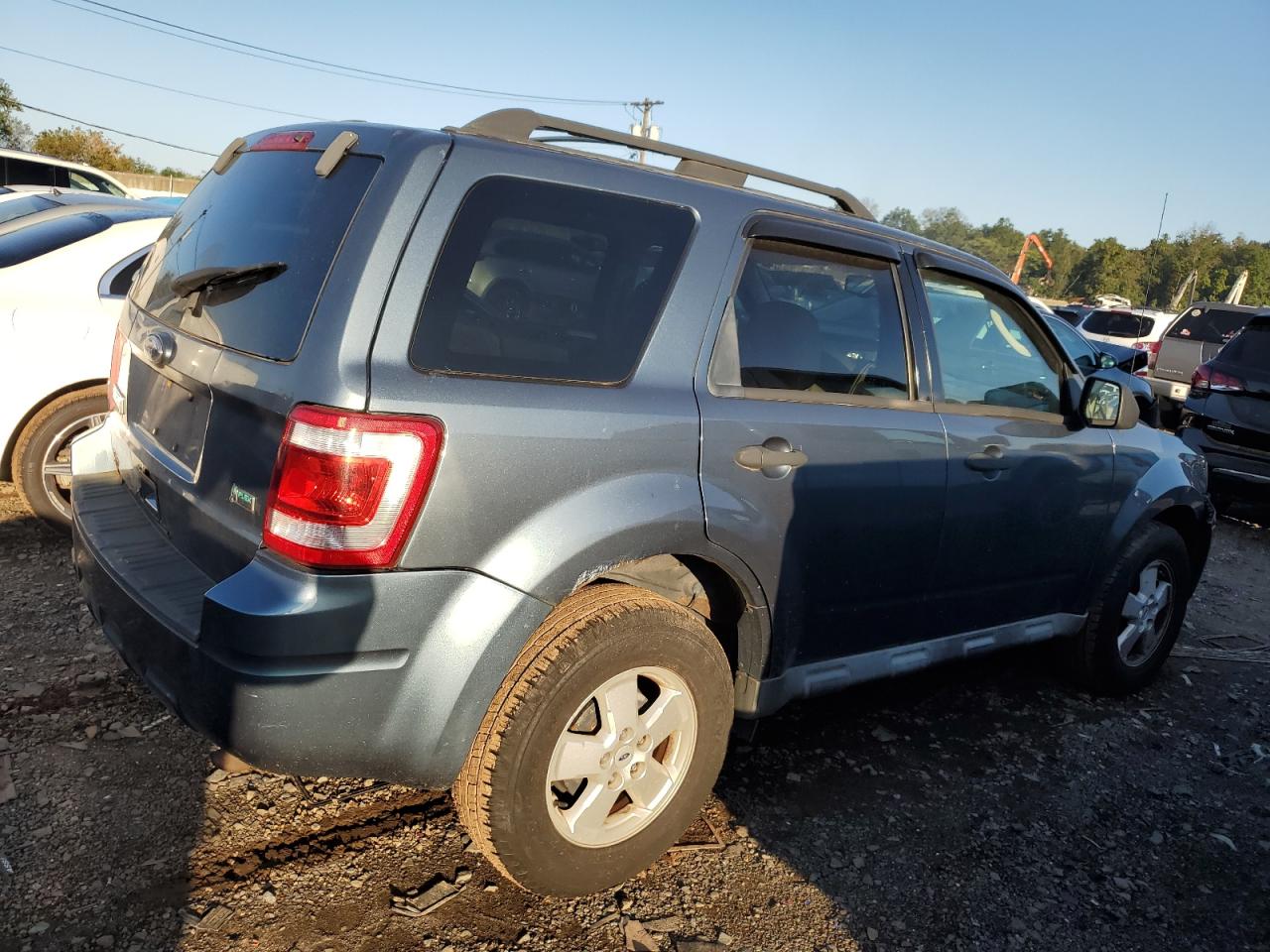 Изображение 3 2010 FORD ESCAPE XLT 2010 с VIN 1FMCU9DG5AKA09162