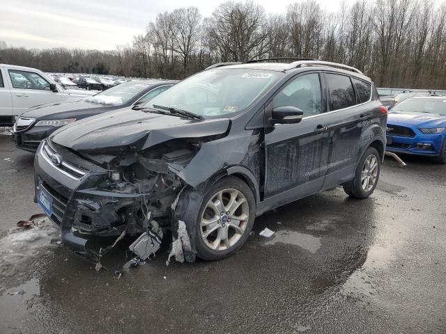 Obraz 1 z 2014 FORD ESCAPE TITANIUM 2014 z VIN 1FMCU0J96EUE05659