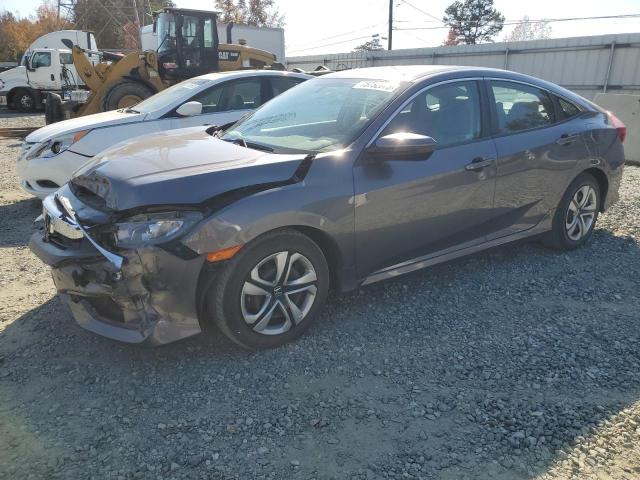 Изображение 1 2018 HONDA CIVIC LX 2018 с VIN 19XFC2F52JE038094