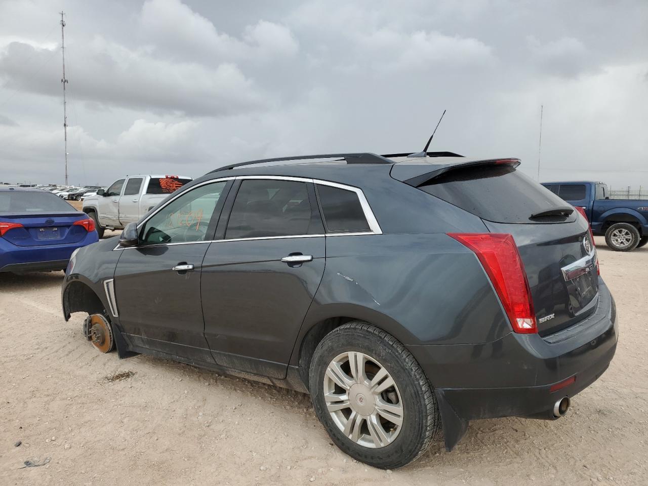 Obraz 2 z Cadillac Srx 2013 z VIN 3GYFNAE35DS549982