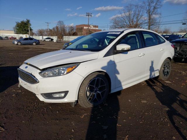 Image 1 of 2015 FORD FOCUS SE 2015 with VIN 1FADP3F25FL258857