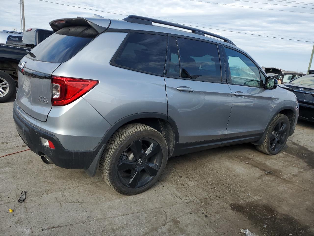 Image 3 of 2021 HONDA PASSPORT ELITE 2021 with VIN 5FNYF8H05MB021566