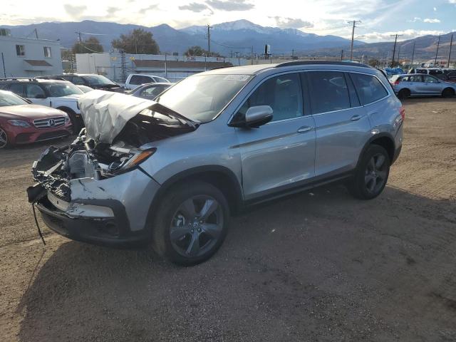 Image 1 of 2022 HONDA PILOT SE 2022 with VIN 5FNYF6H20NB070035