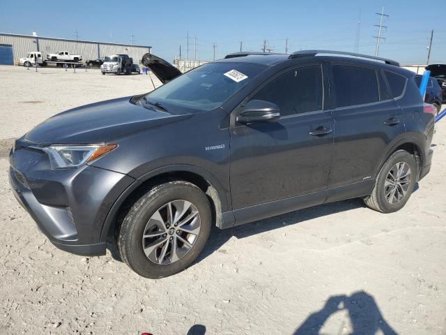 Image 1 of 2018 TOYOTA RAV4 HV LE 2018 with VIN JTMRJREV8JD198897