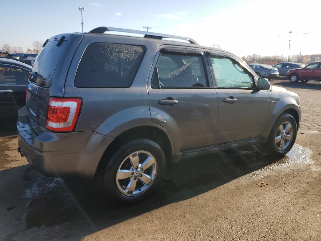 Image 3 of 2010 FORD ESCAPE LIMITED 2010 with VIN 1FMCU0EG8AKC82901
