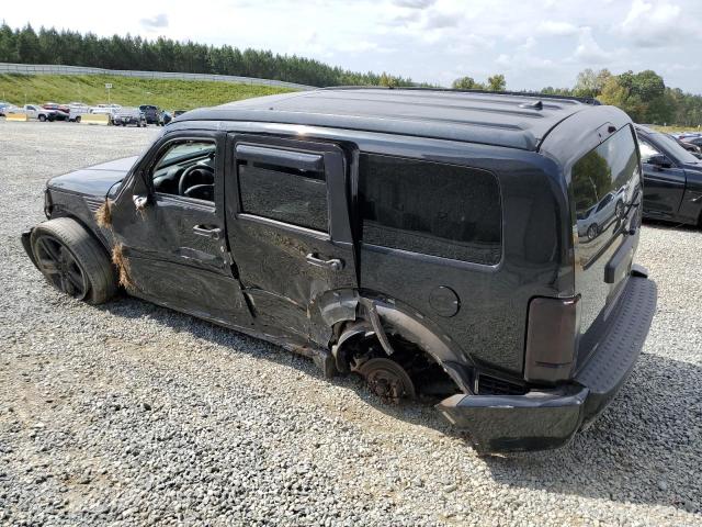 Image 2 of Dodge Nitro Heat 2011 with VIN 1D4PT4GX5BW606574