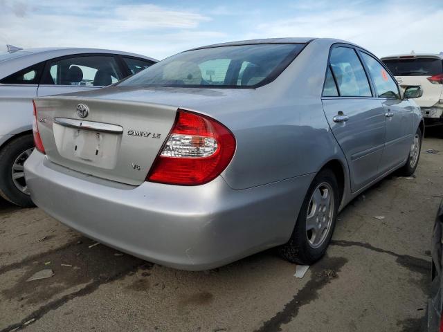 Obraz 3 z 2002 TOYOTA CAMRY LE 2002 z VIN 4T1BF30K32U030322