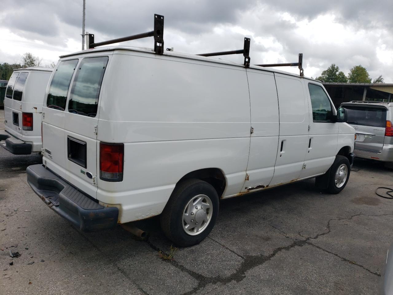 Obraz 3 z 2011 FORD ECONOLINE E150 VAN 2011 z VIN 1FTNE1EW6BDA22395