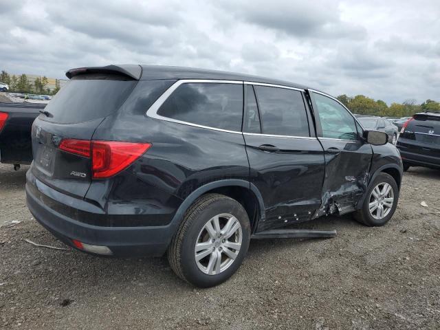 Image 3 of 2017 HONDA PILOT LX 2017 with VIN 5FNYF6H11HB101885